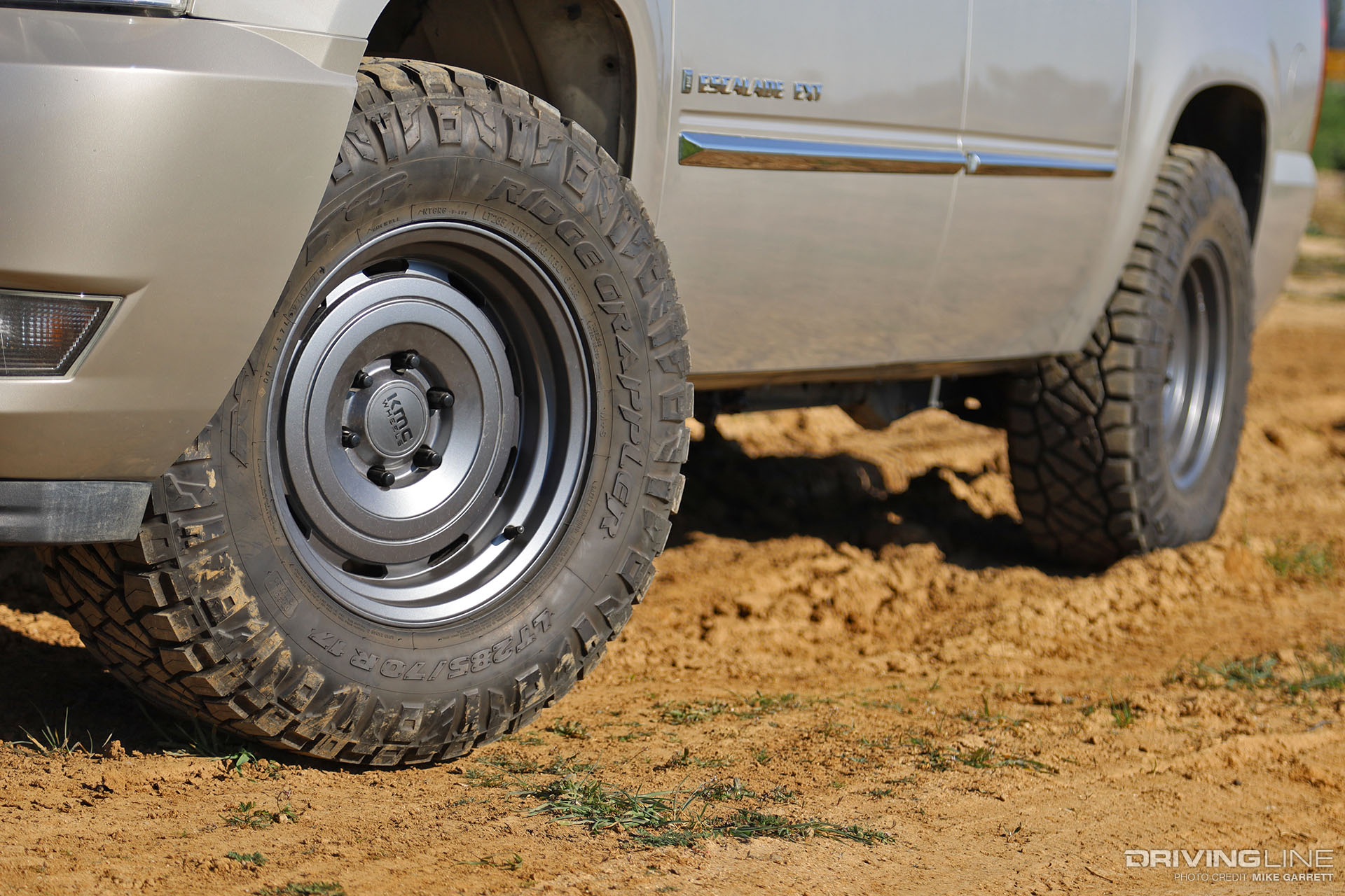 Escalade EXT on Nitto Ridge Grappler and KMC Roswell