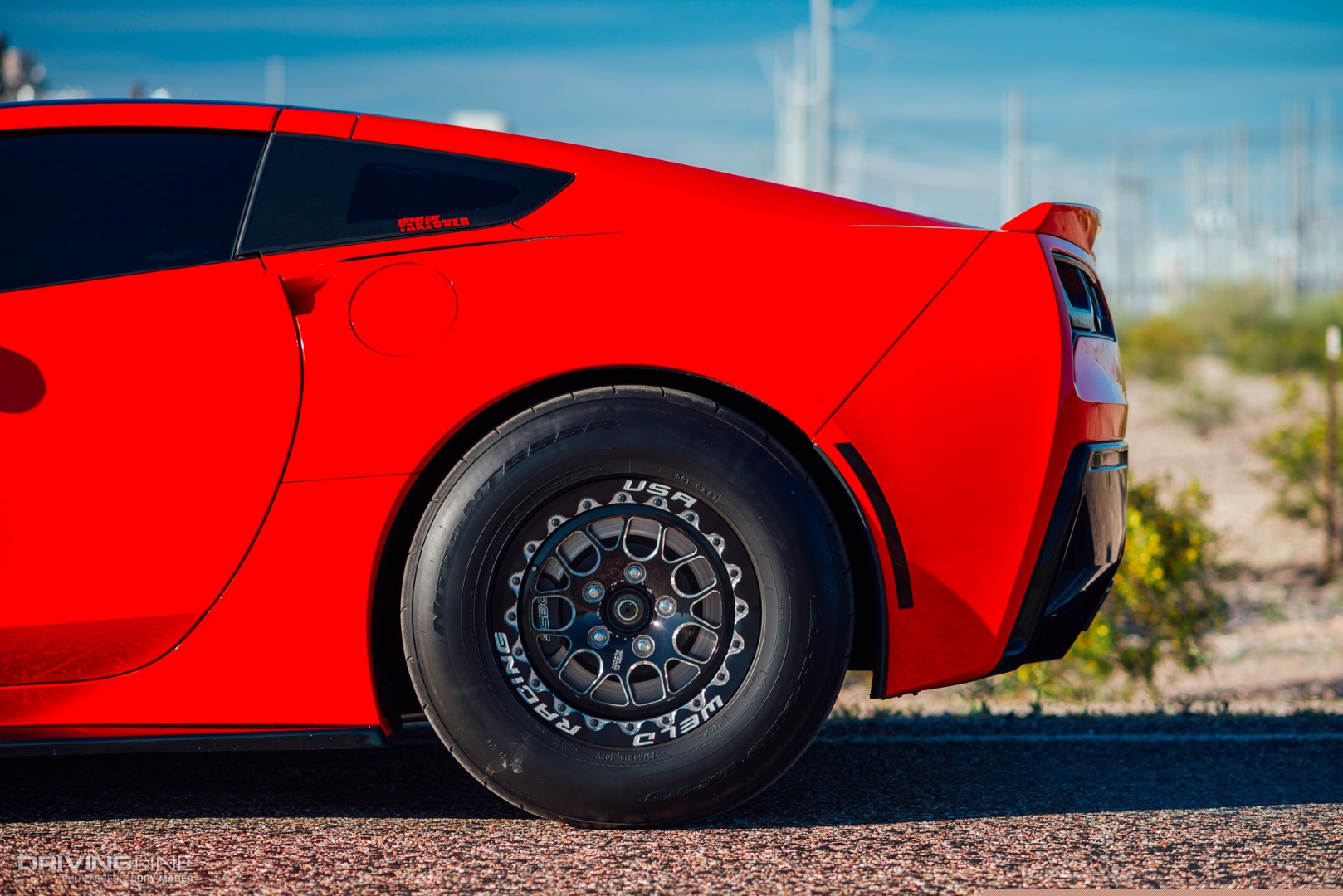 Chevrolet Corvette Stingray on Nittos red rear wheel view