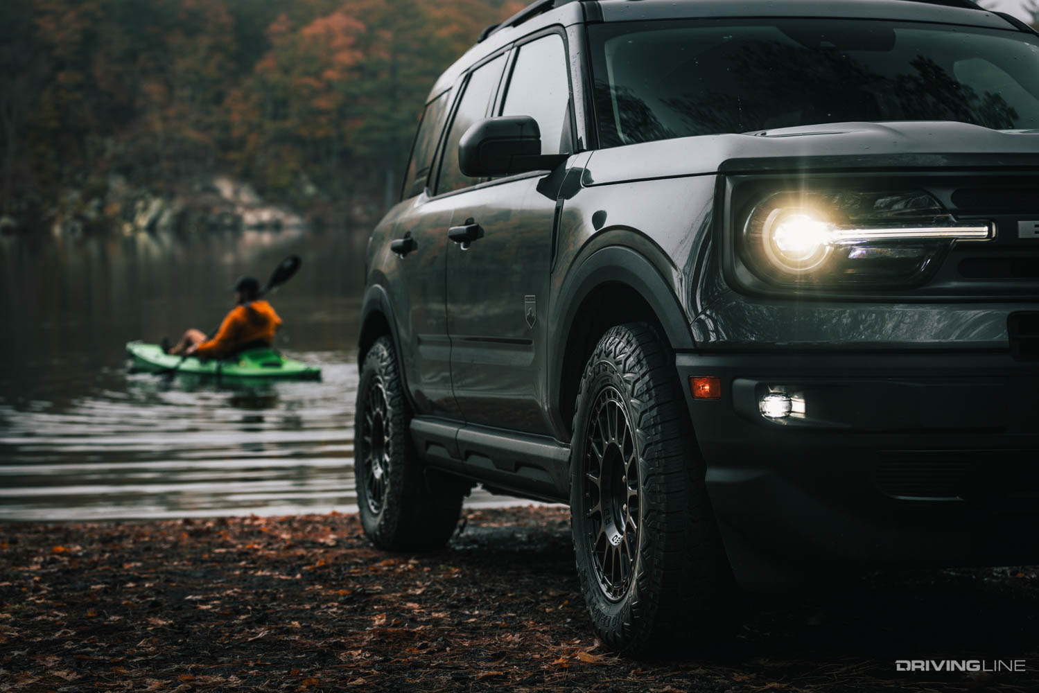 Nitto Nomad Grappler Tire on Bronco Sport with kayaker in the background