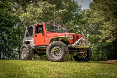 A History Of The Jeep Wrangler TJ, Chrysler's First Modern 4x4 That Birthed  The Rubicon | DrivingLine