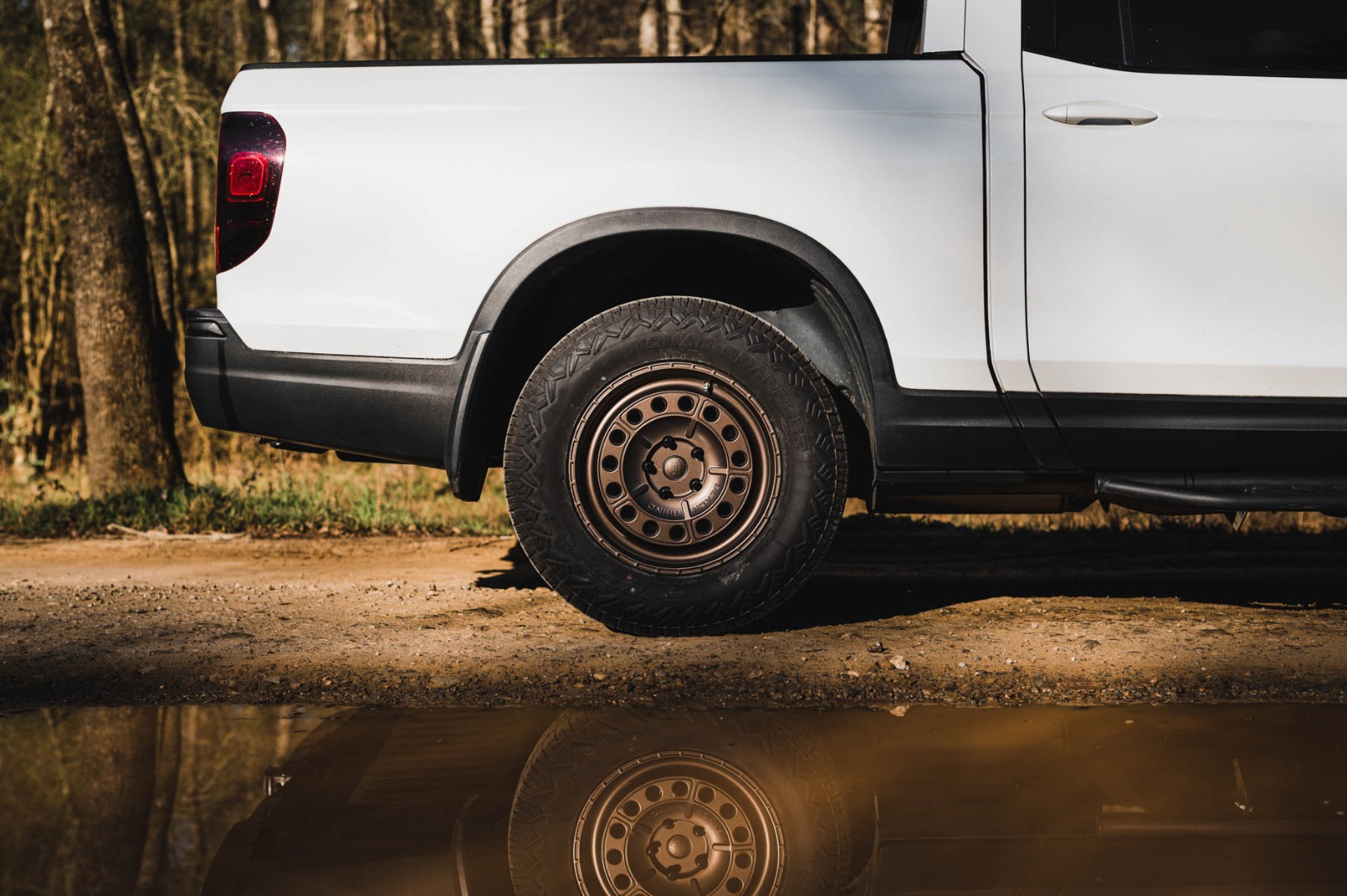 Rear of a Honda Ridgeline with Nitto Nomad Grappler tires