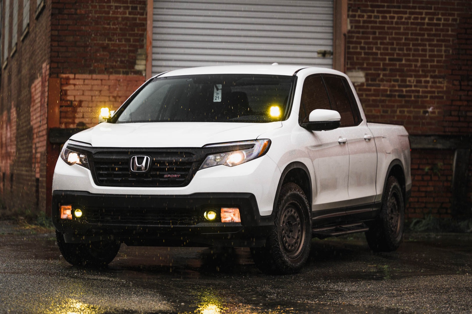 Front of Honda Ridgeline in the rain