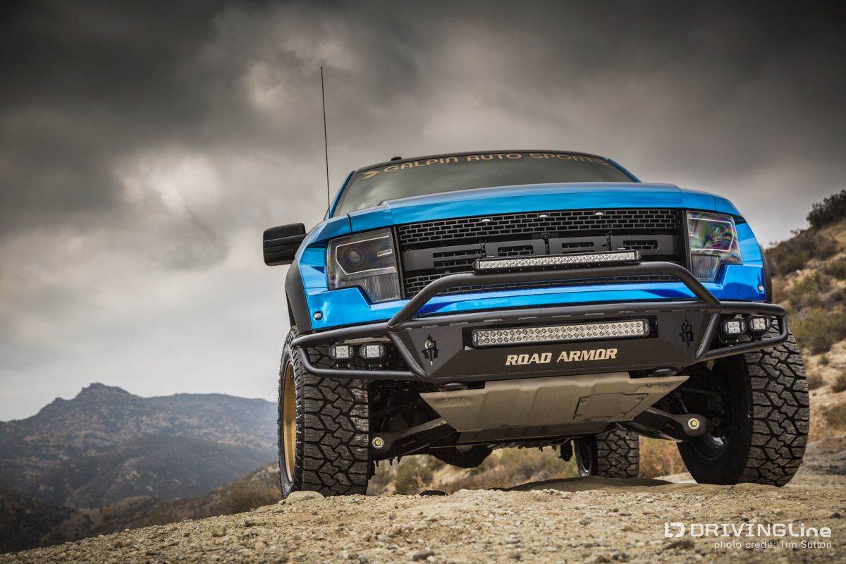 Ford F-150 SVT Raptor on Nittos in blue front view