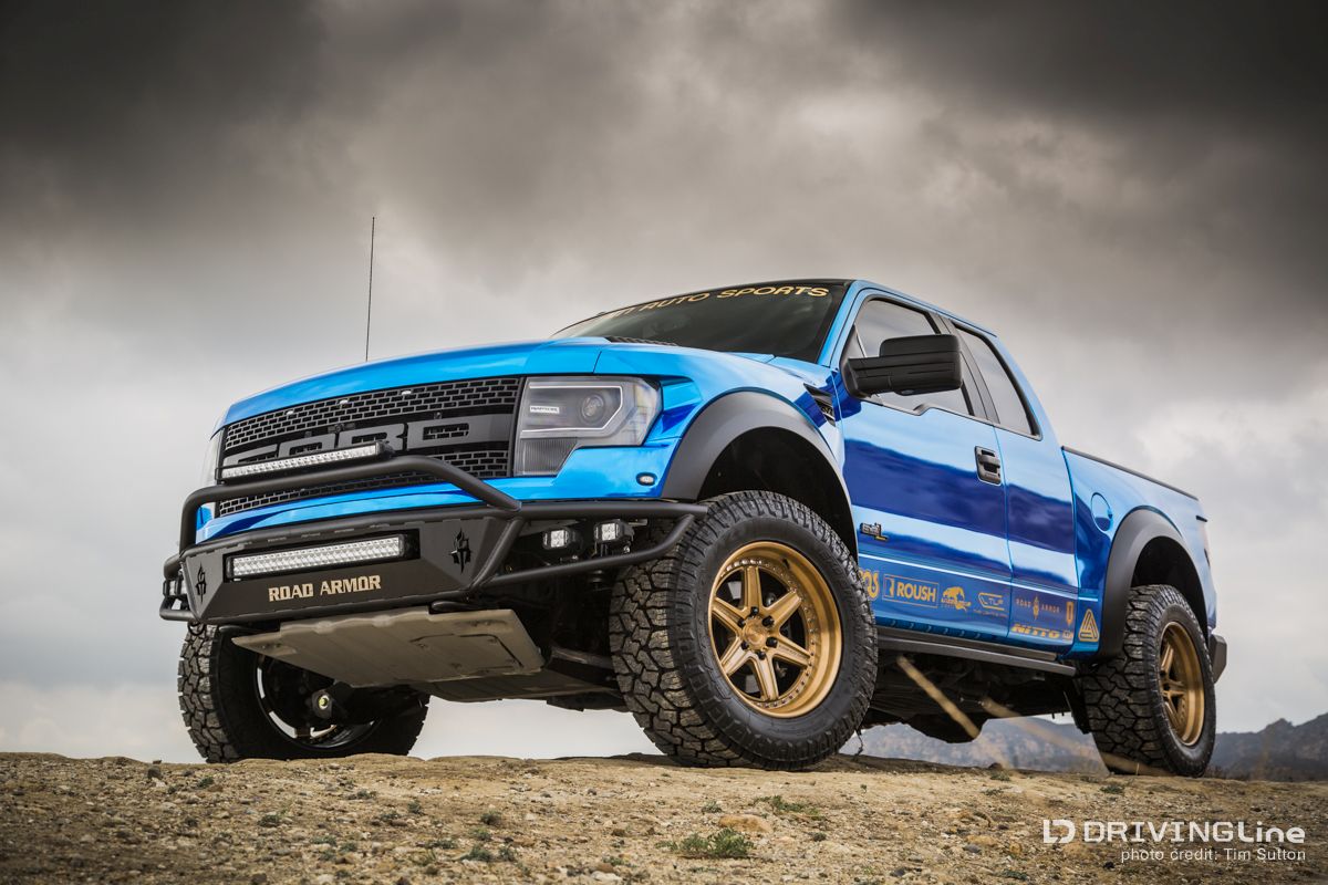 Ford F-150 SVT Raptor on Nittos in blue front 3/4 view