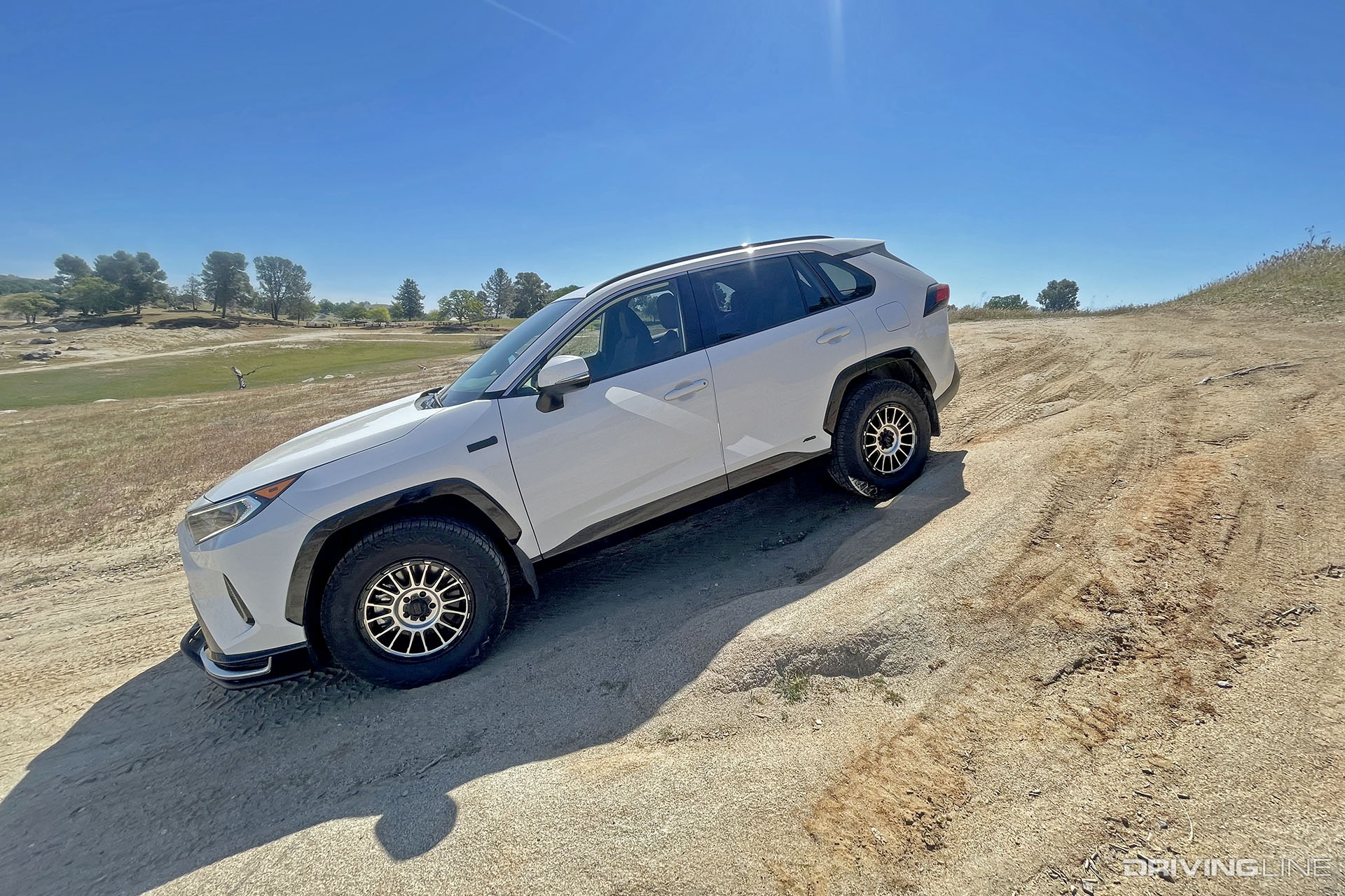 Toyota RAV4 Prime on Nitto Nomad Grappler KMC Impact Wheels