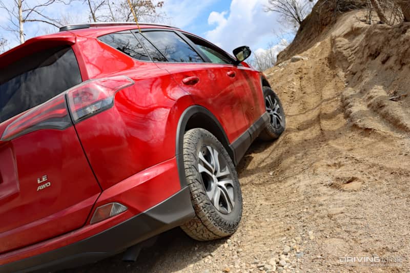 RAV4 climbing a hill off-road