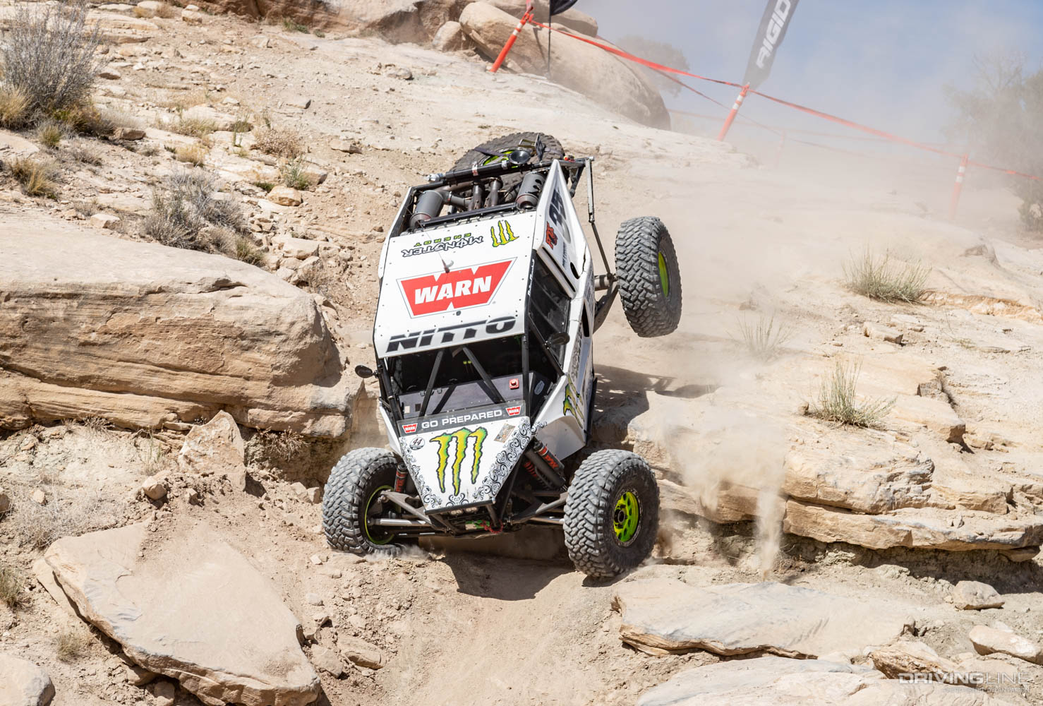 Bailey Campbell racing down rocky canyon in Ultra4 Off-Road race on Nitto Tires