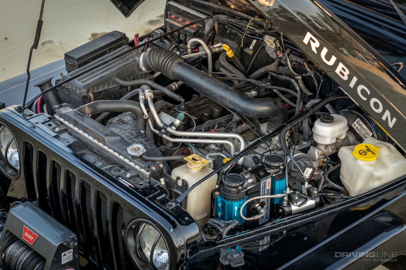 4.0L Inline 6 engine in a 2005 Jeep Wrangler Rubicon TJ Build on 37s and 1-ton axles