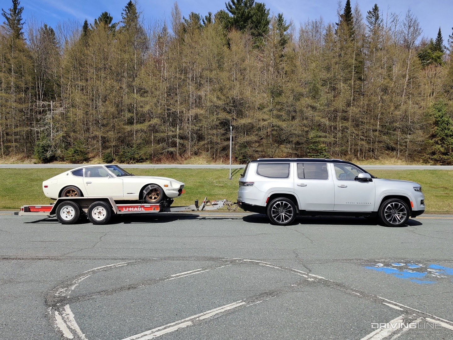 2022 Jeep Grand Wagoneer towing Datsun 280Z side view