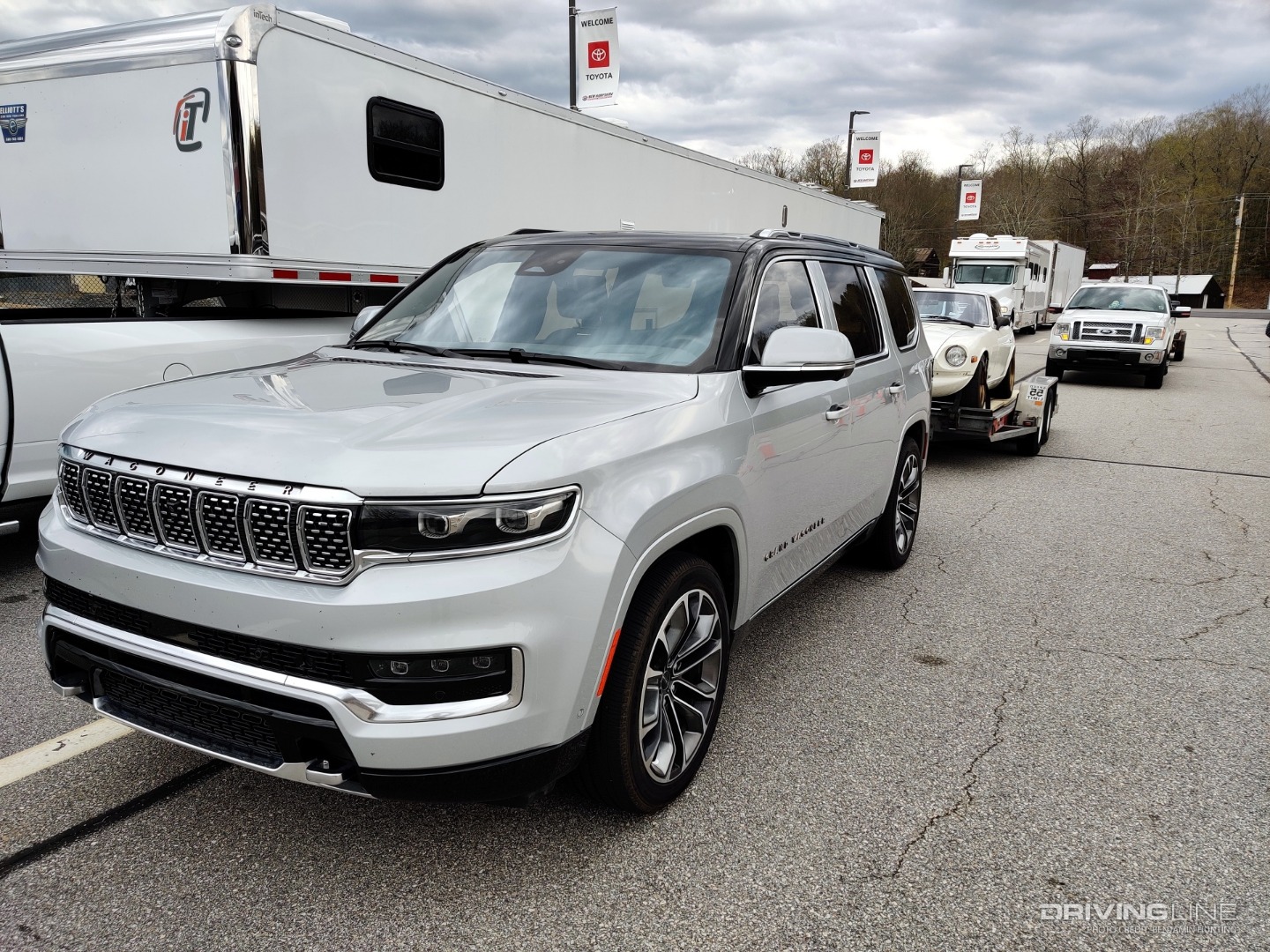 2022 Jeep Grand Wagoneer towing Datsun 280Z at NHMS entrance