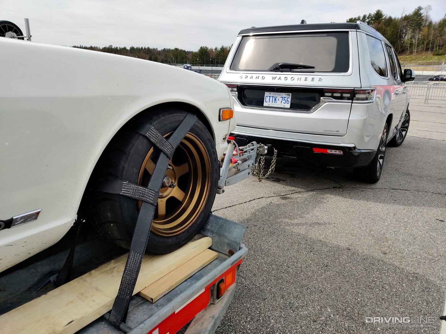 2022 Jeep Grand Wagoneer towing Datsun 280Z rear view