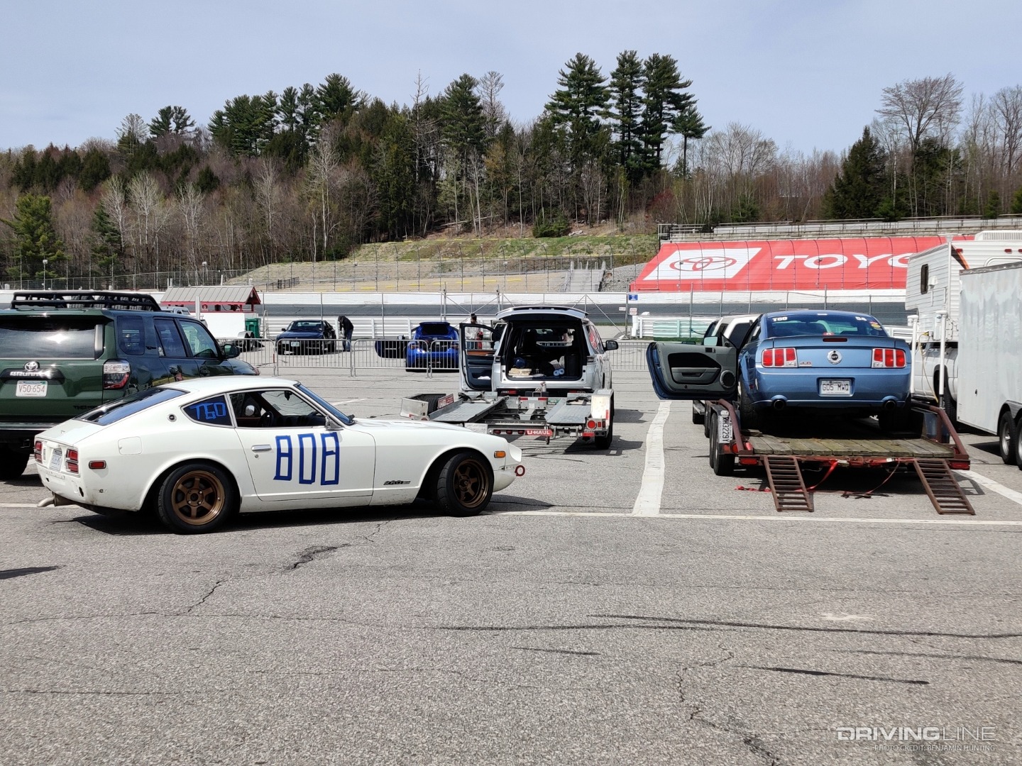 Datsun and Mustang with trailers at NHMS