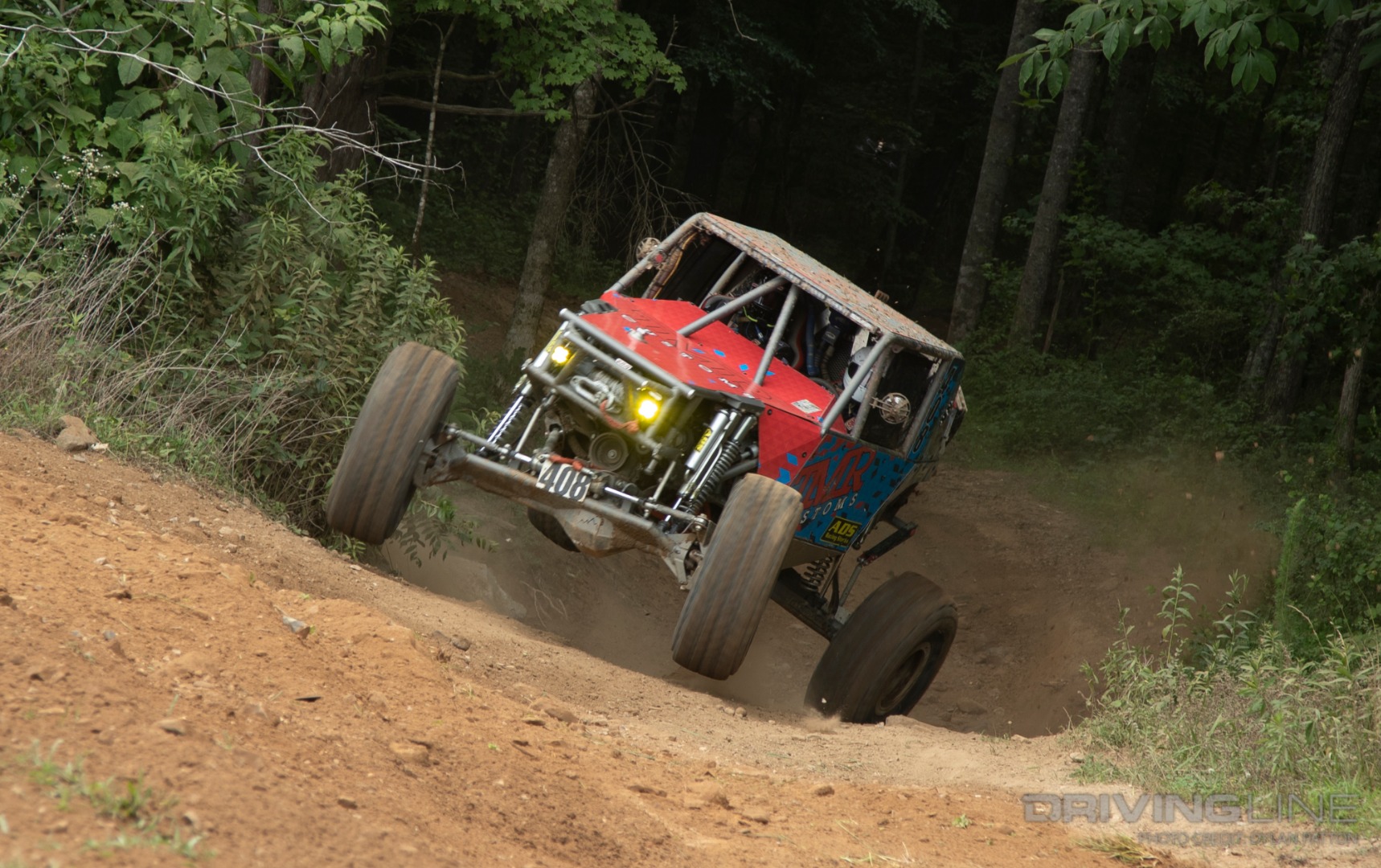 Canadian Racing team racing though the woods