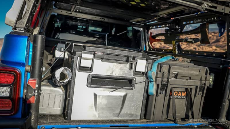 Jeep Gladiator Rubicon on 40s Overland Build gear inside the bed including an ARB refrigerator