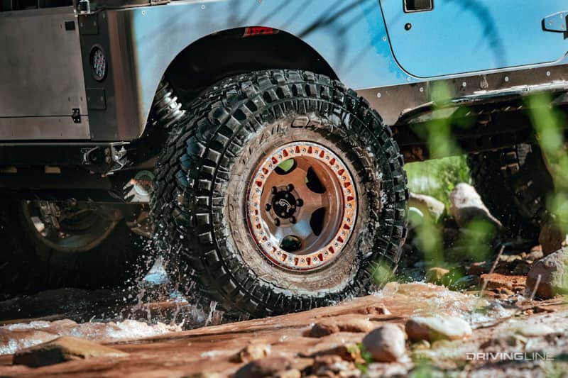 nitto trail grapplers off roading in water on a Jeep