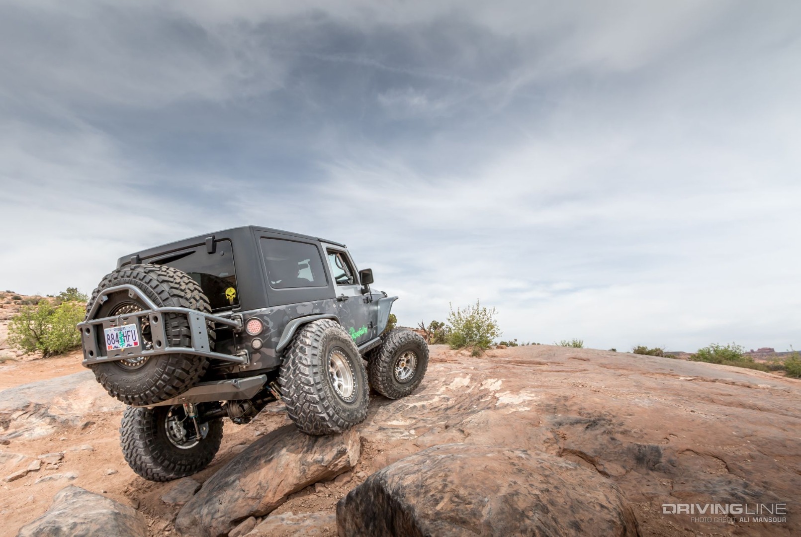 Gray Jeep Wrangler JK on Nitto Trail Grappler tires rock crawling