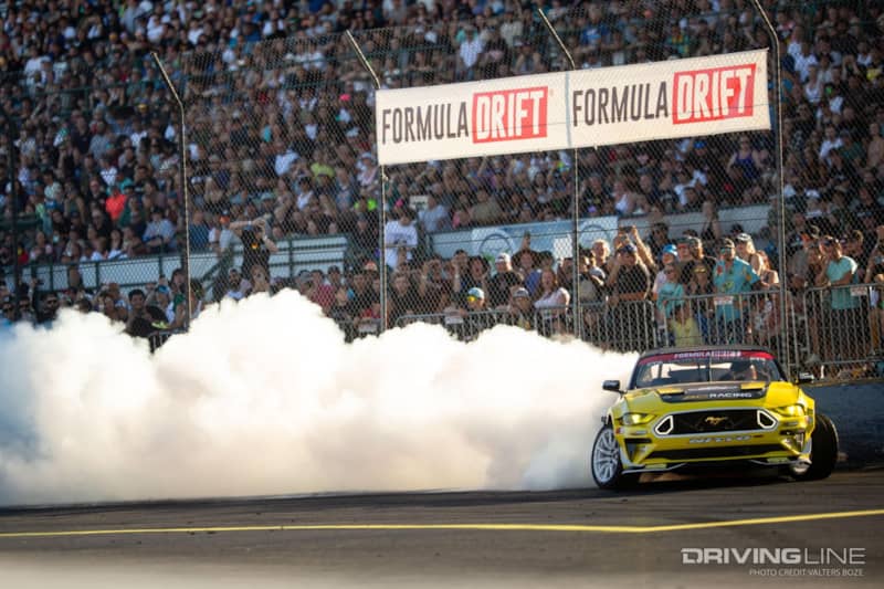 Chelsea DeNofa's RTR Mustang competing in Formula Drift illustrating negative camber suspension tuning