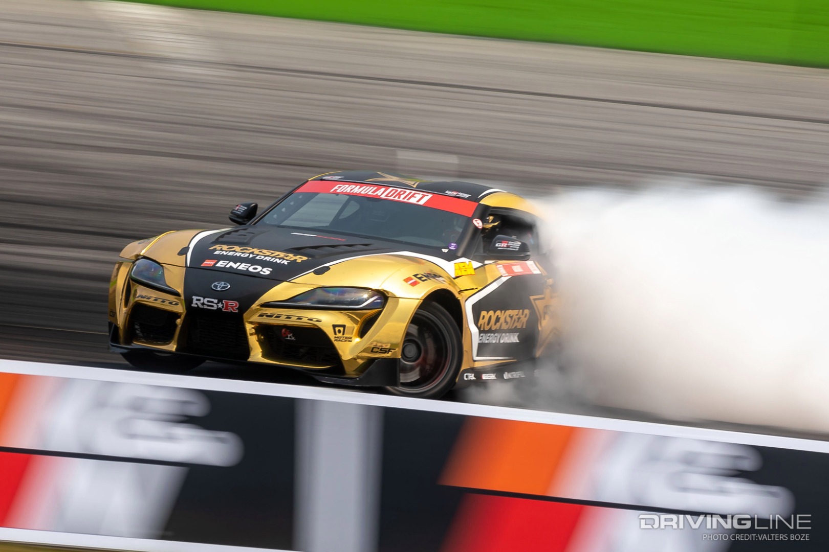 Fredric Aasbo drifting on track with Papadakis built I6 Turbo engine