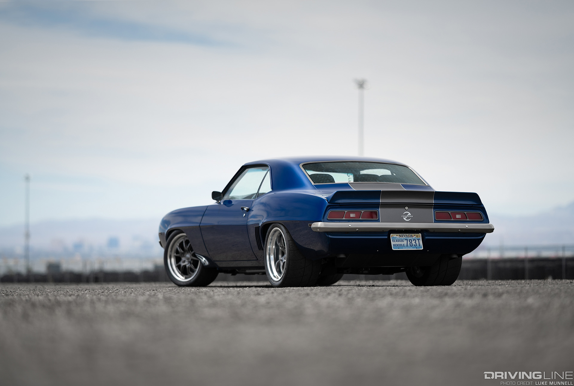 blue ls 69 camaro on nitto nt 01 tires rear view