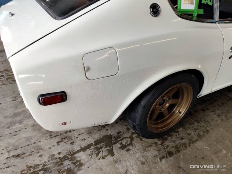 Datsun 280Z wet tire rear view
