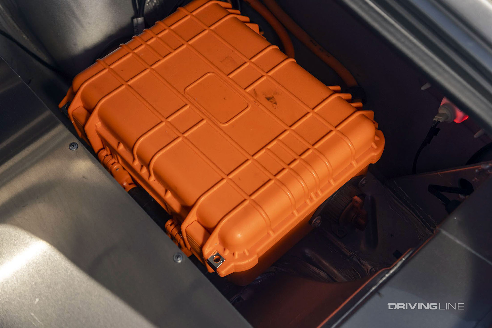 close up of tesla s driveline in ev muscle car with nitto tires