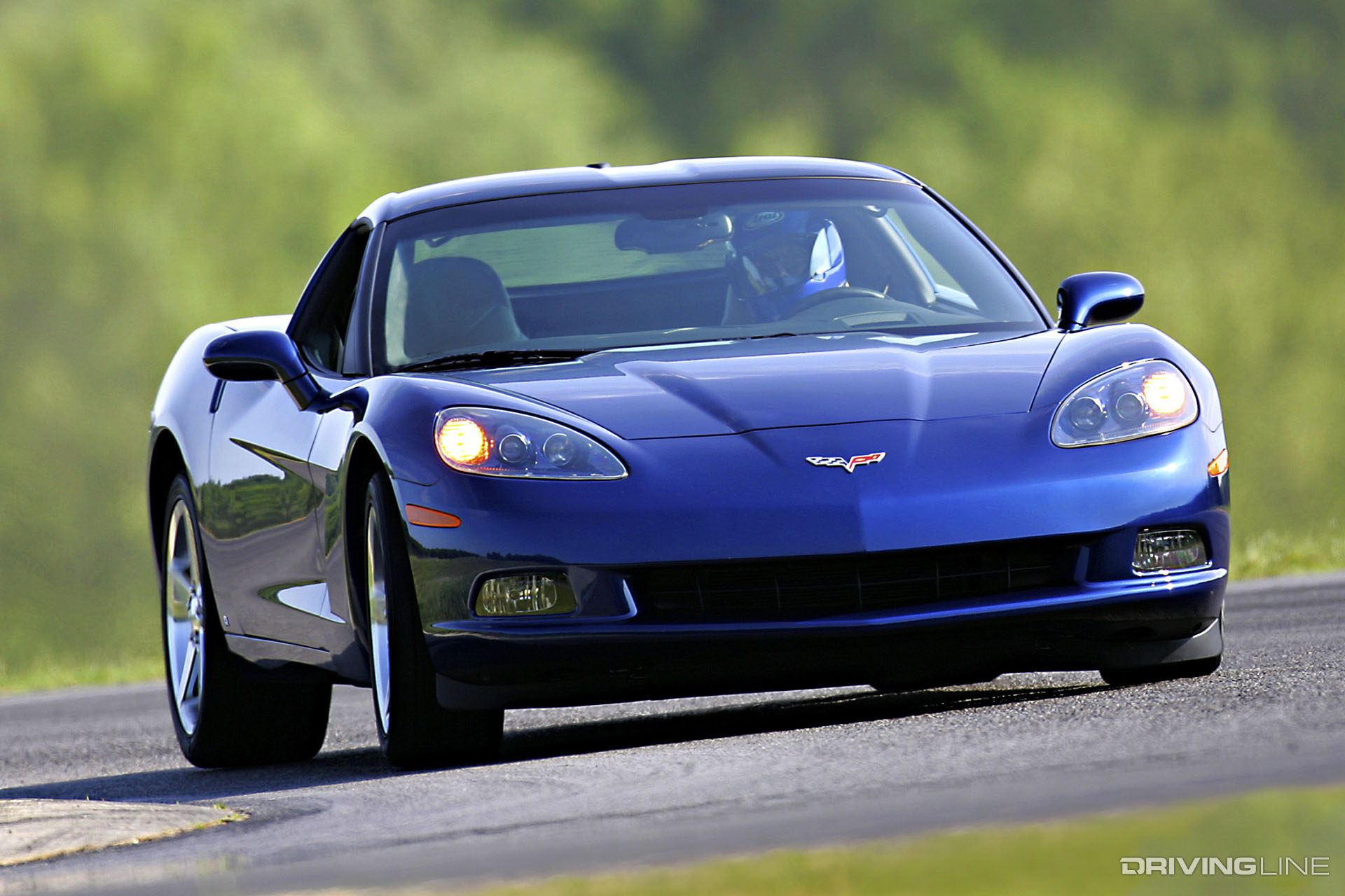 Blue C6 Corvette on Race Track