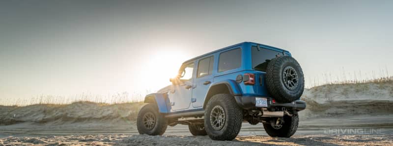 Blue Jeep Wrangler 392 on Nitto Recon Grappler on a beach