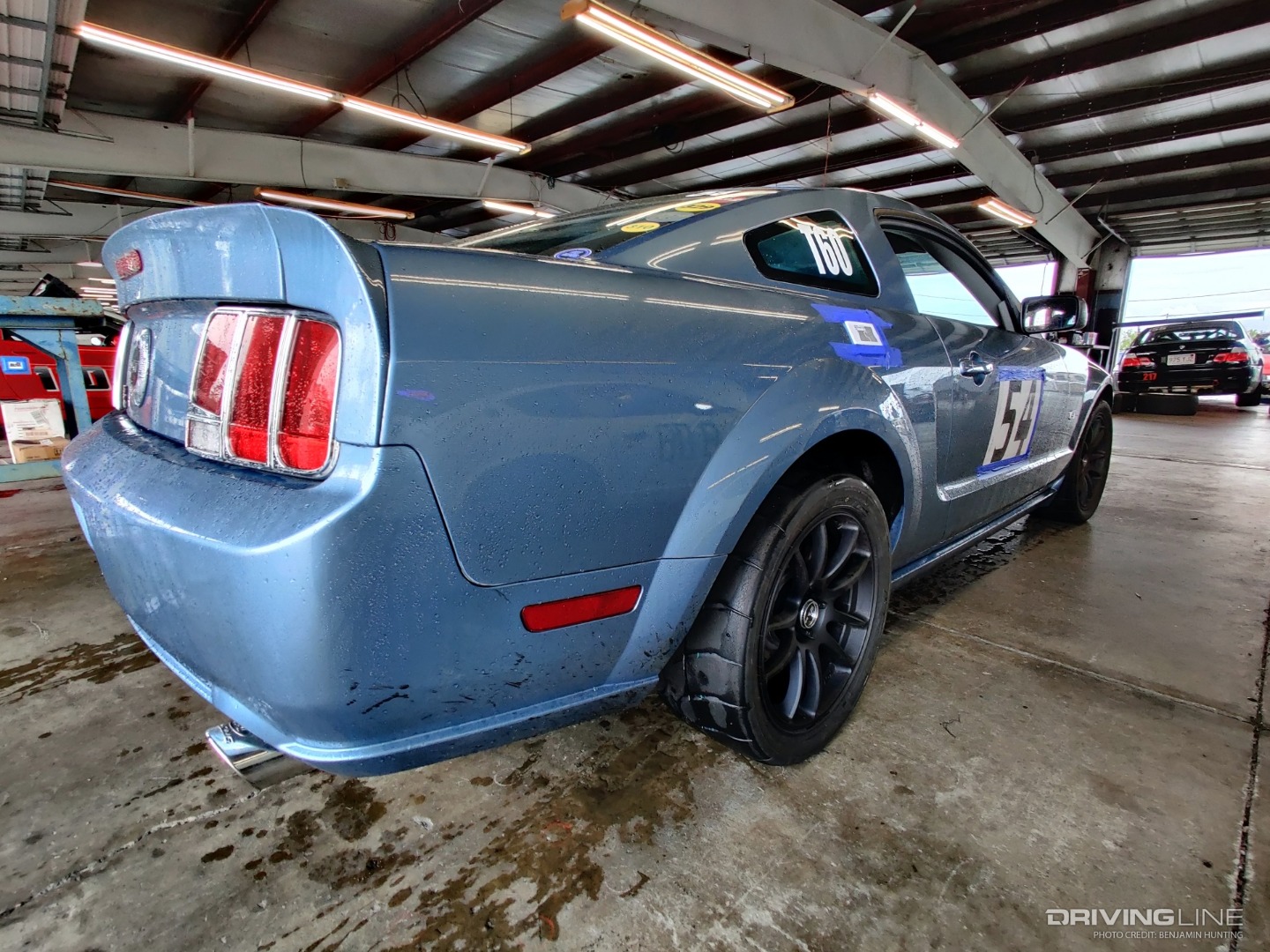 2005 Ford Mustang GT rear view wet NT01 Nitto