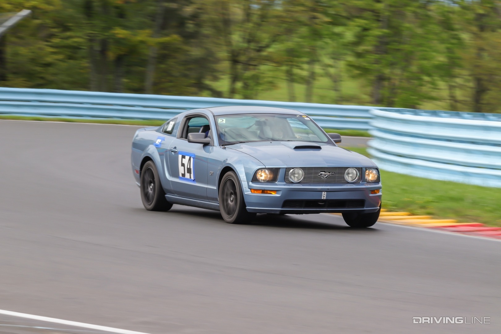 2005 Ford Mustang GT cornering at speed Nitto NT01 WGI