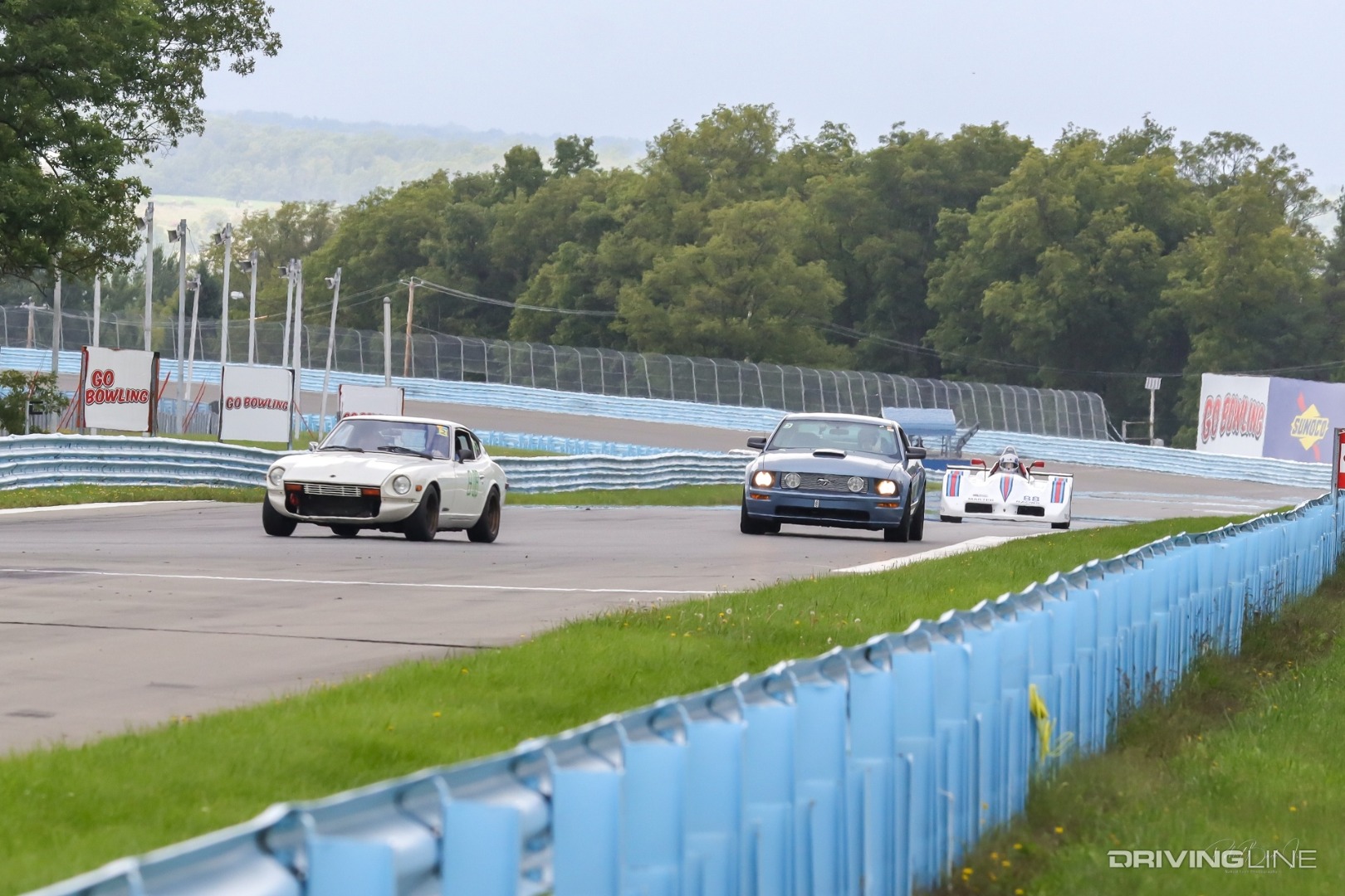 2005 Ford Mustang GT Datsun Z on track WGI