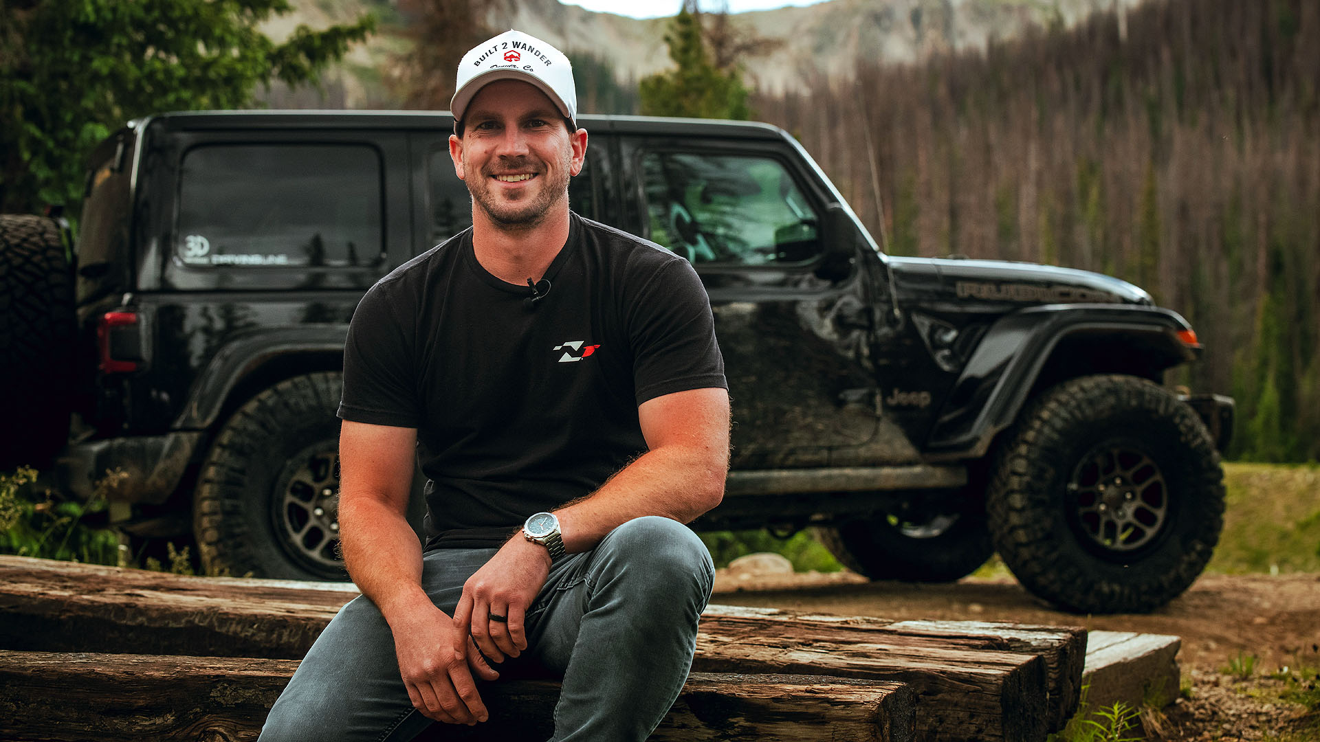 collin coates of built2wander sitting at hancock pass