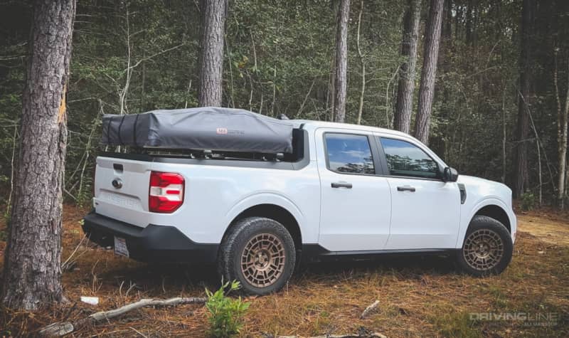 2022 Ford Maverick Hybrid XL Overland on Nomad Grappler tires in woody forest