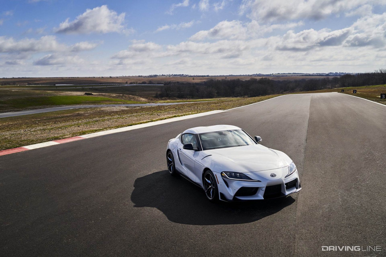 Toyota Supra on the track in white