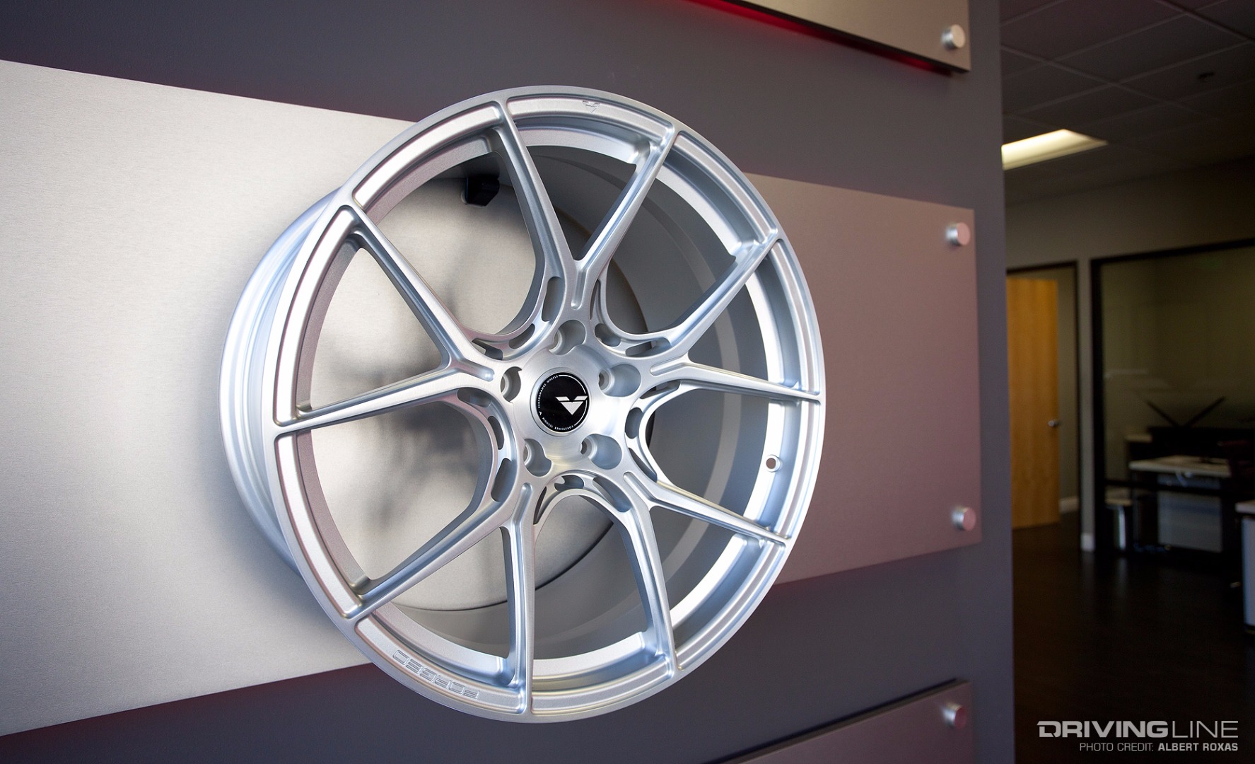 Forged wehel on wall