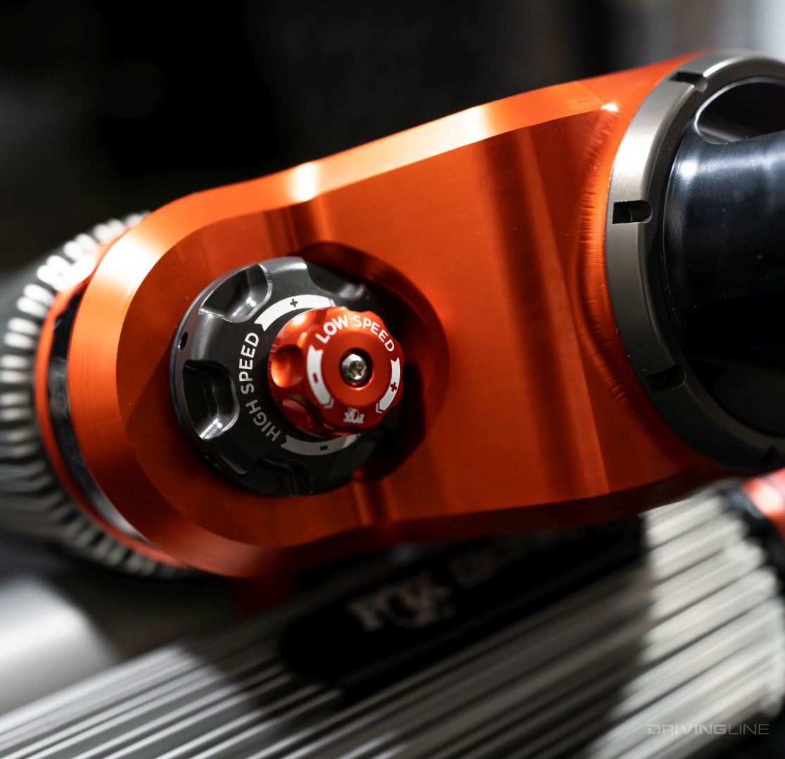 Detail of Fox 30 Shocks DSC high-speed and low speed adjustment knobs