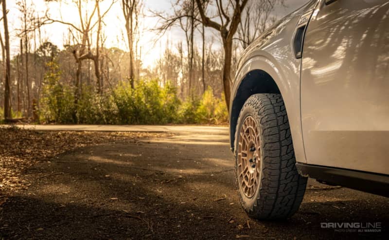 Front driver side wheel of 2022 Ford Maverick XL on Nitto Tire Nomad Grappler