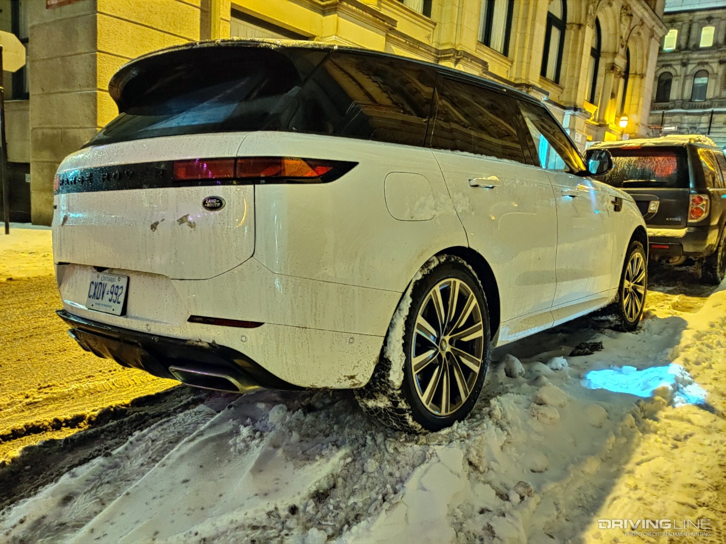 2023 Land Rover Range Rover Sport night time on snowbank