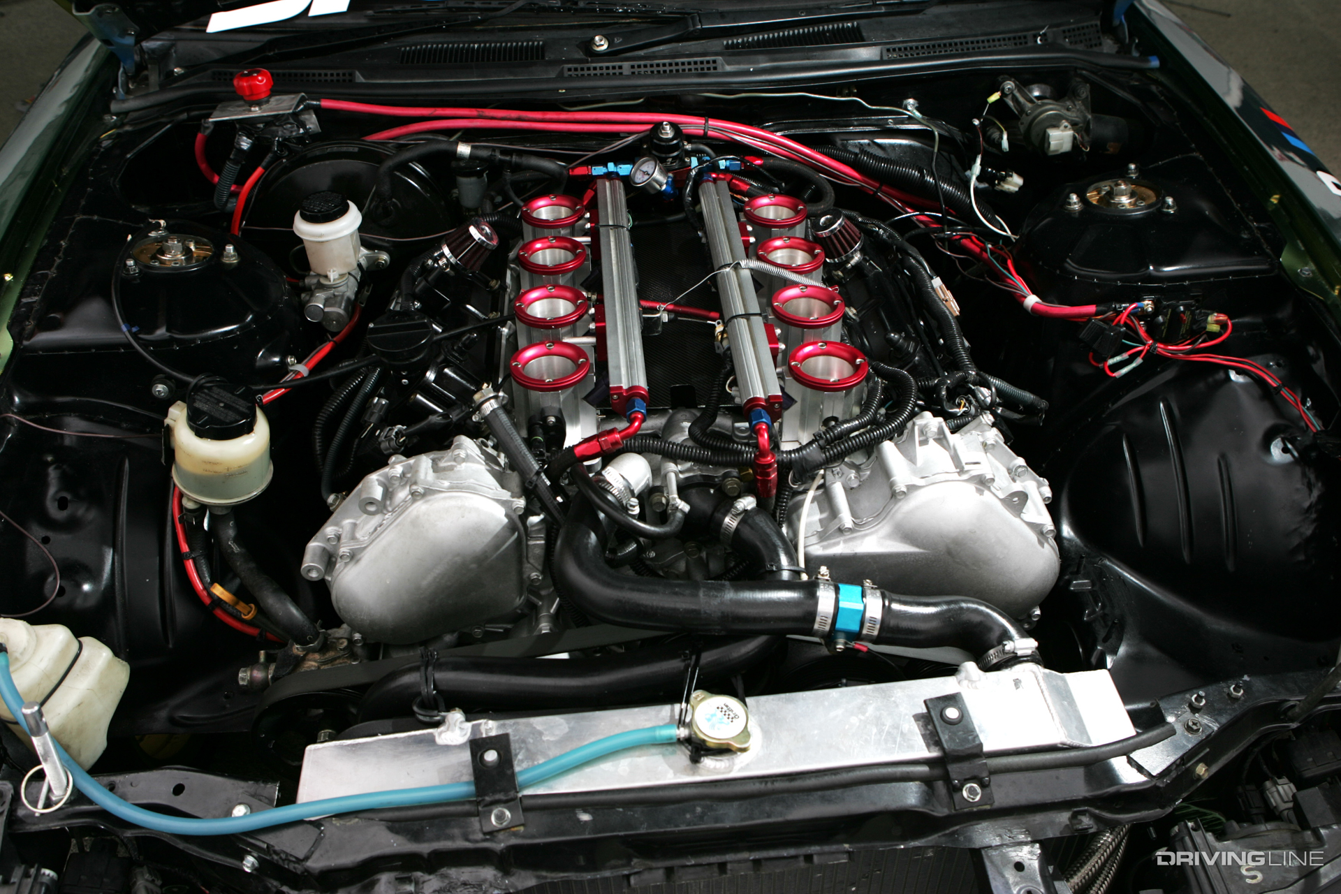 The Drift Emporium Nissan S15 featured a Nissan VK56 V8 engine, which was a very unique engine setup at the time as teams searched for more torque