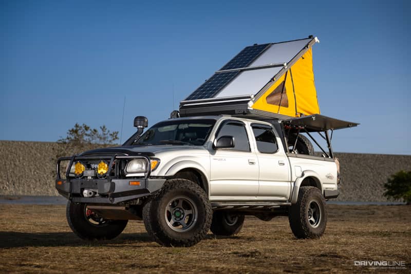 tent and solar panels extended on overland ready toyota tacoma