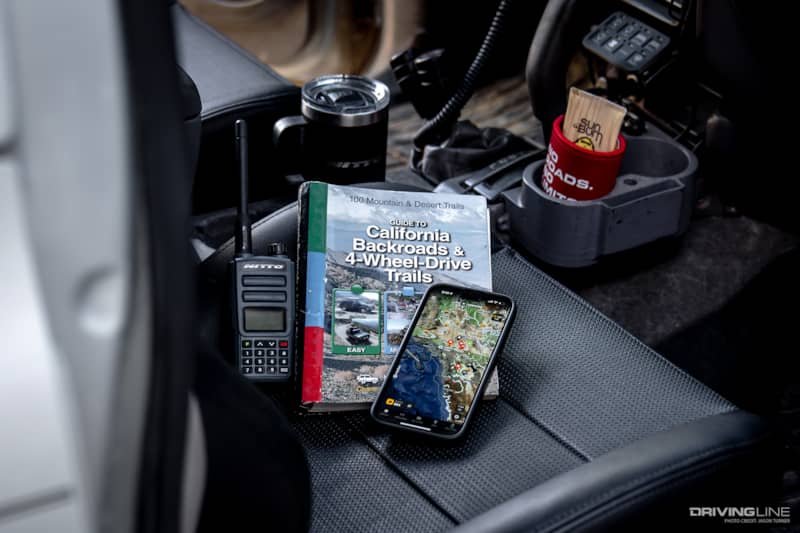 Paper map and digital download map on Truck seat