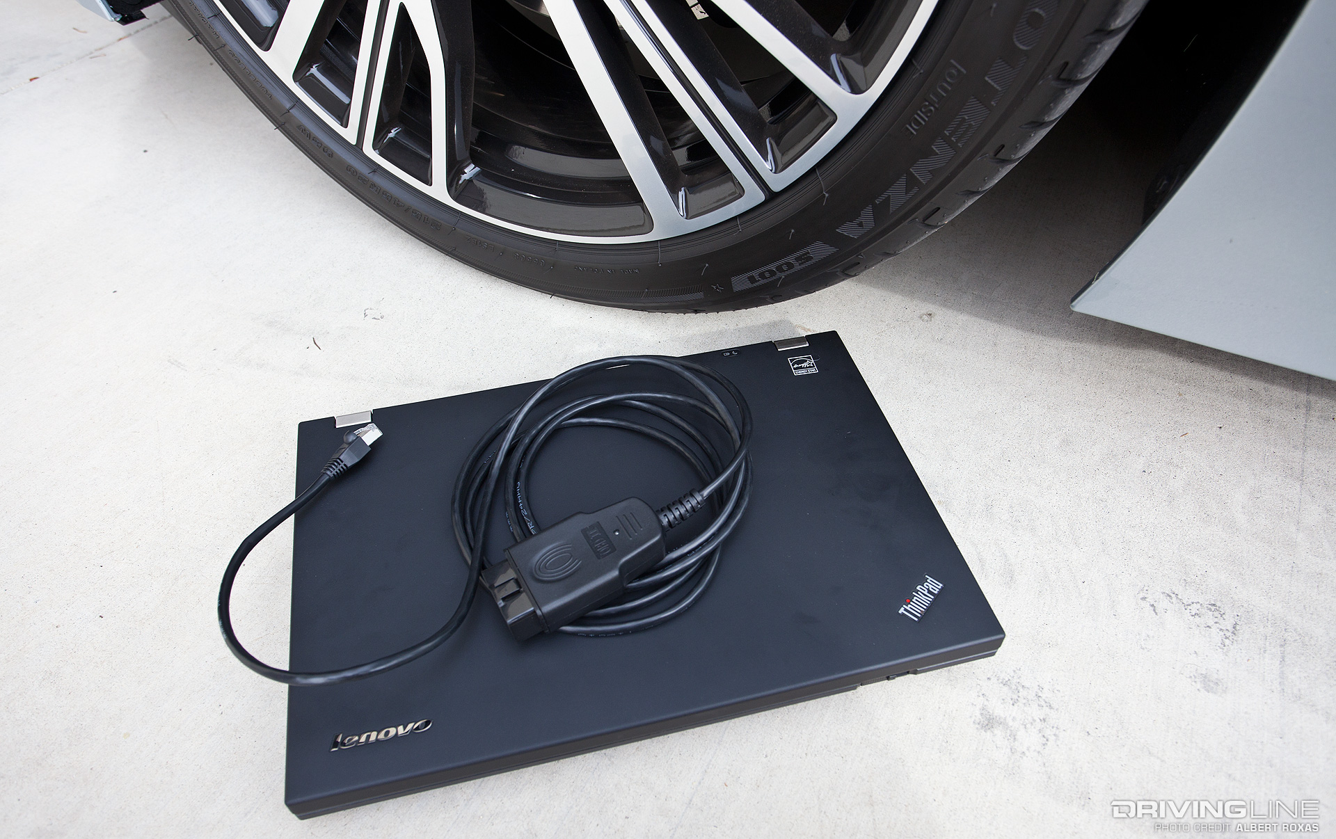 Lenovo laptop next to a wheel