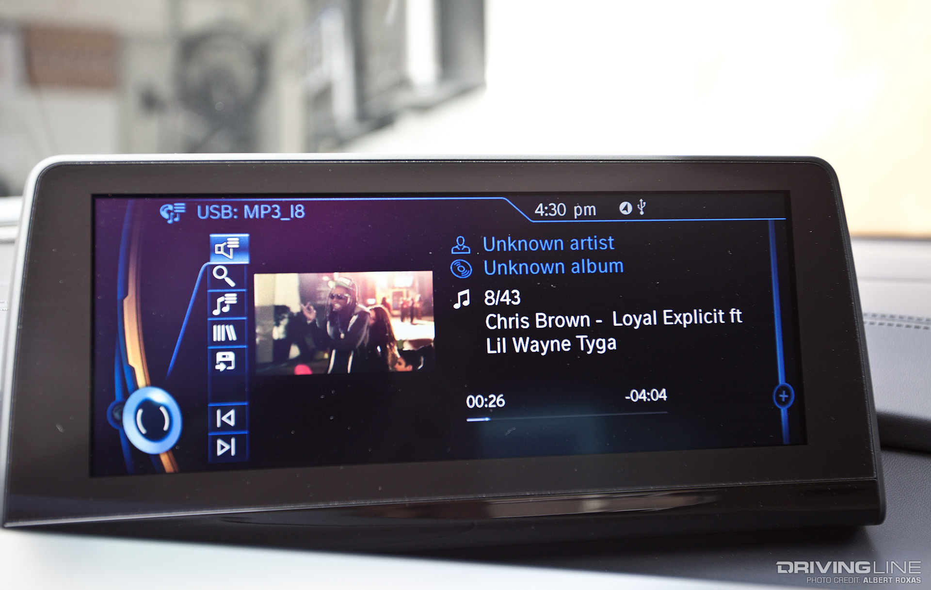 Chris Brown music video playing on the screen with title info next to it