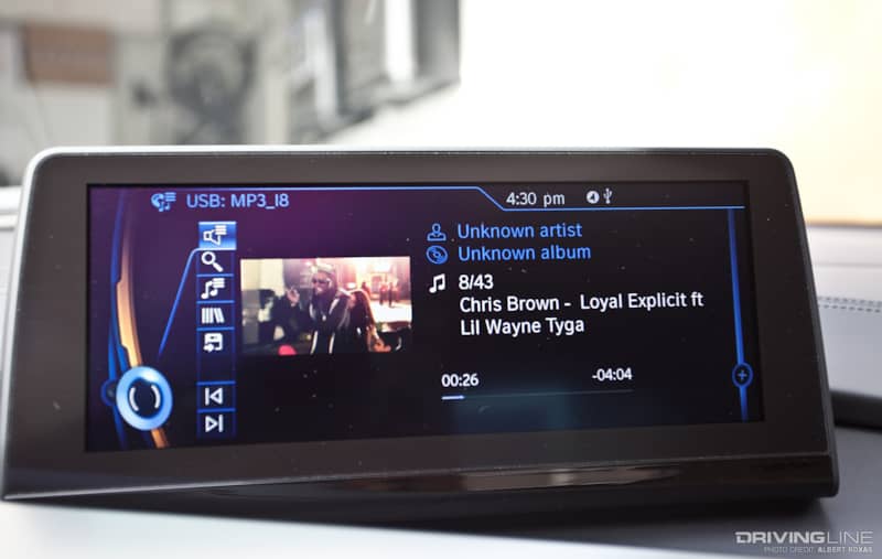Chris Brown music video playing on the screen with title info next to it