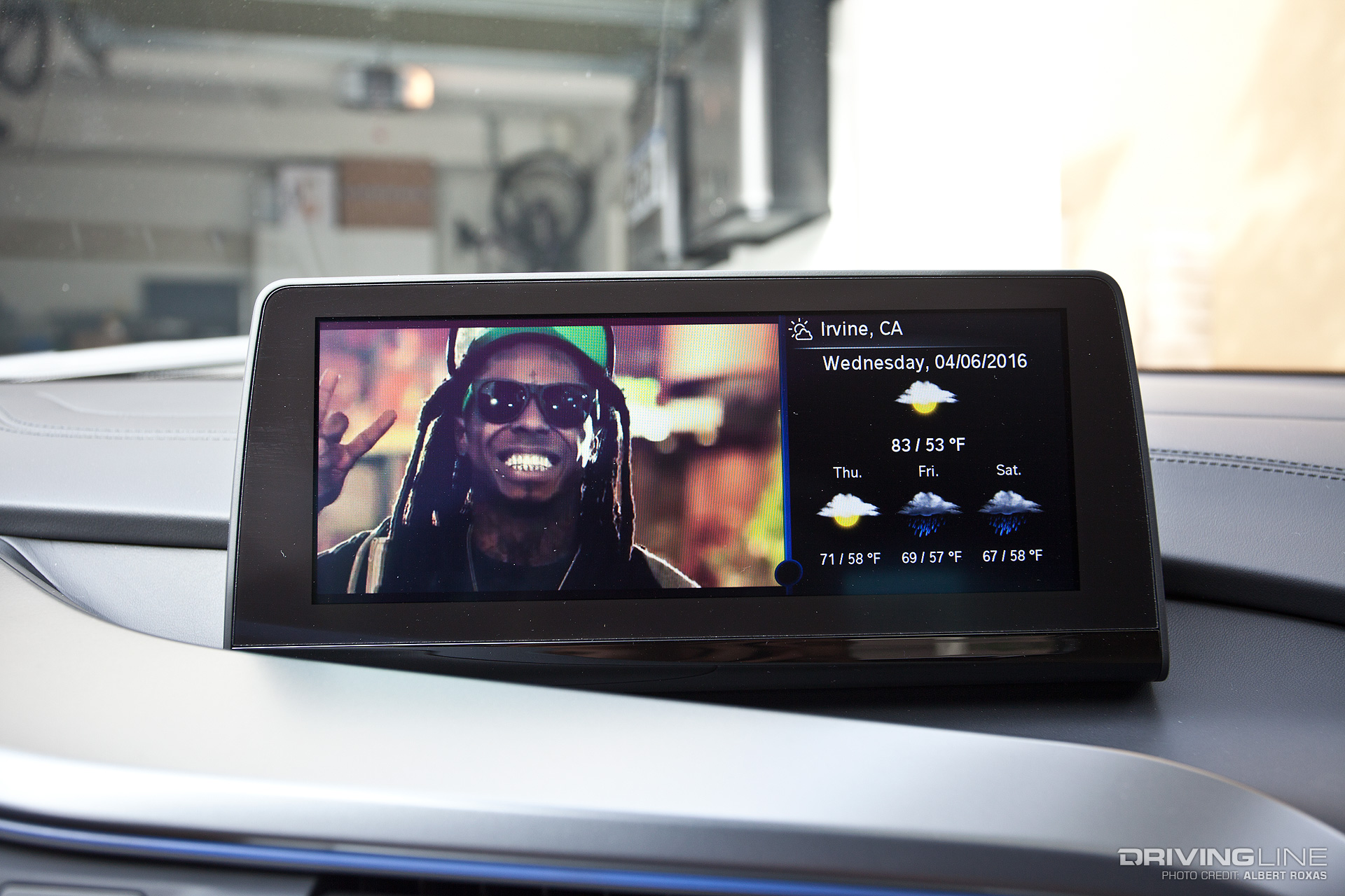 Music video on the left of the screen and weather info on the right