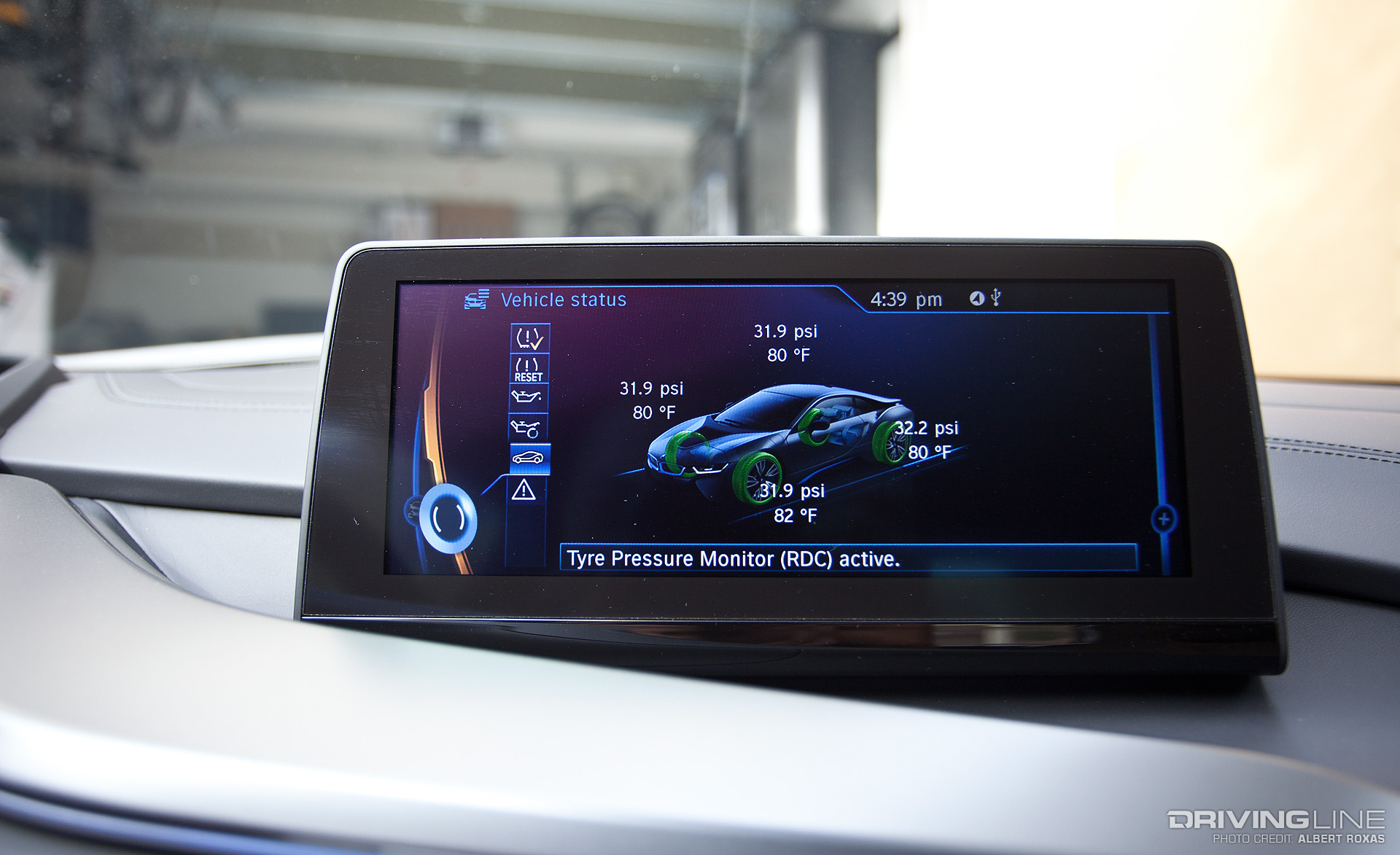 Tire pressure for each tire displayed on the screen with a ghosted picture of the car