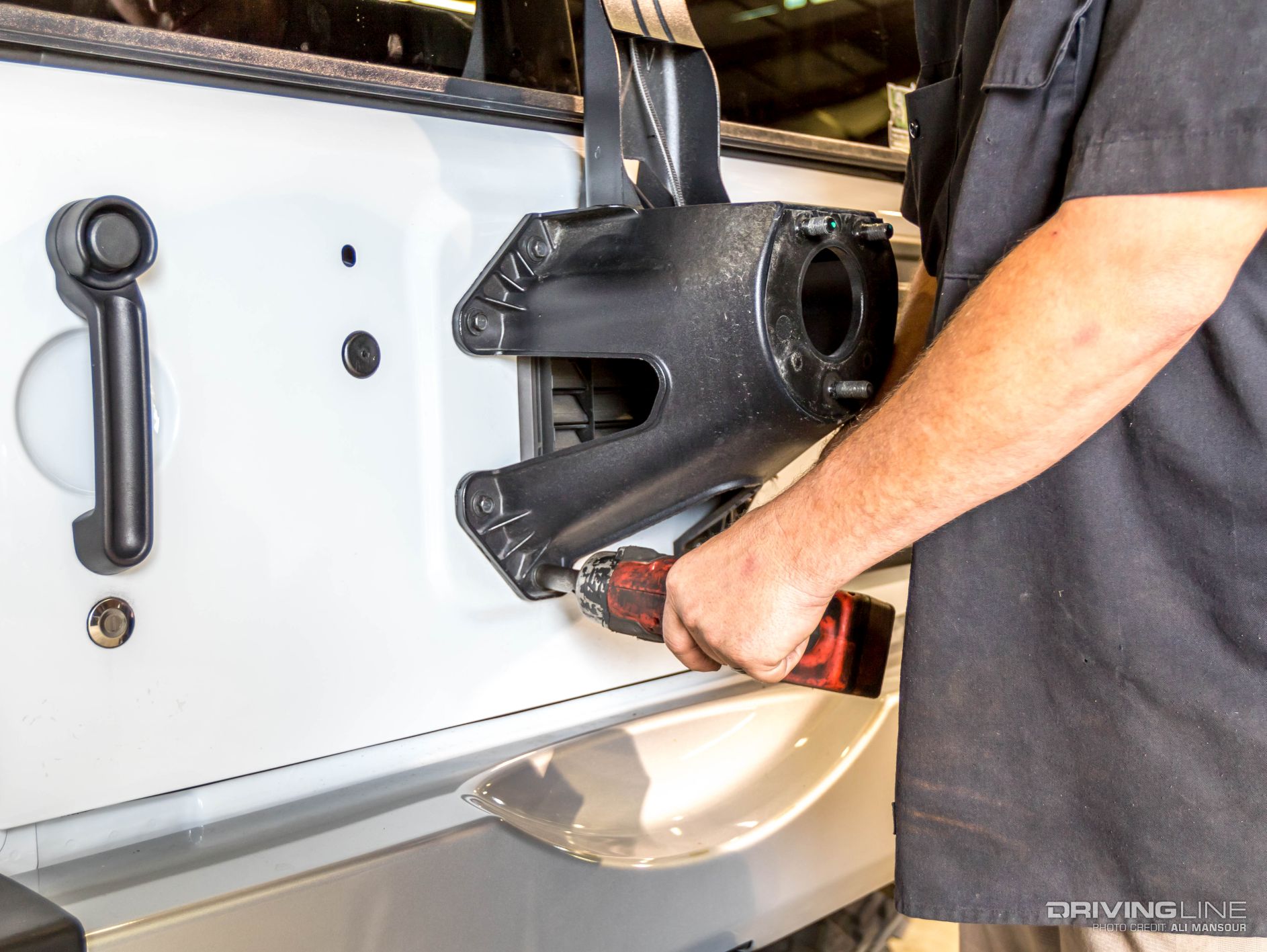 002-2015-jeep-wrangler-fab-fours-tire-carrier-rear-bumper