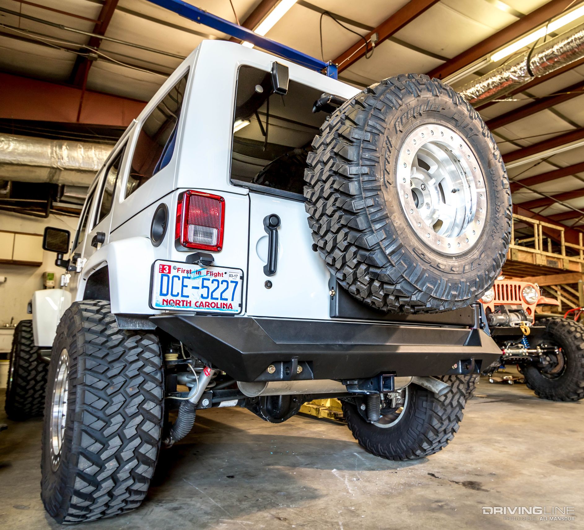 013-2015-jeep-wrangler-fab-fours-tire-carrier-rear-bumper