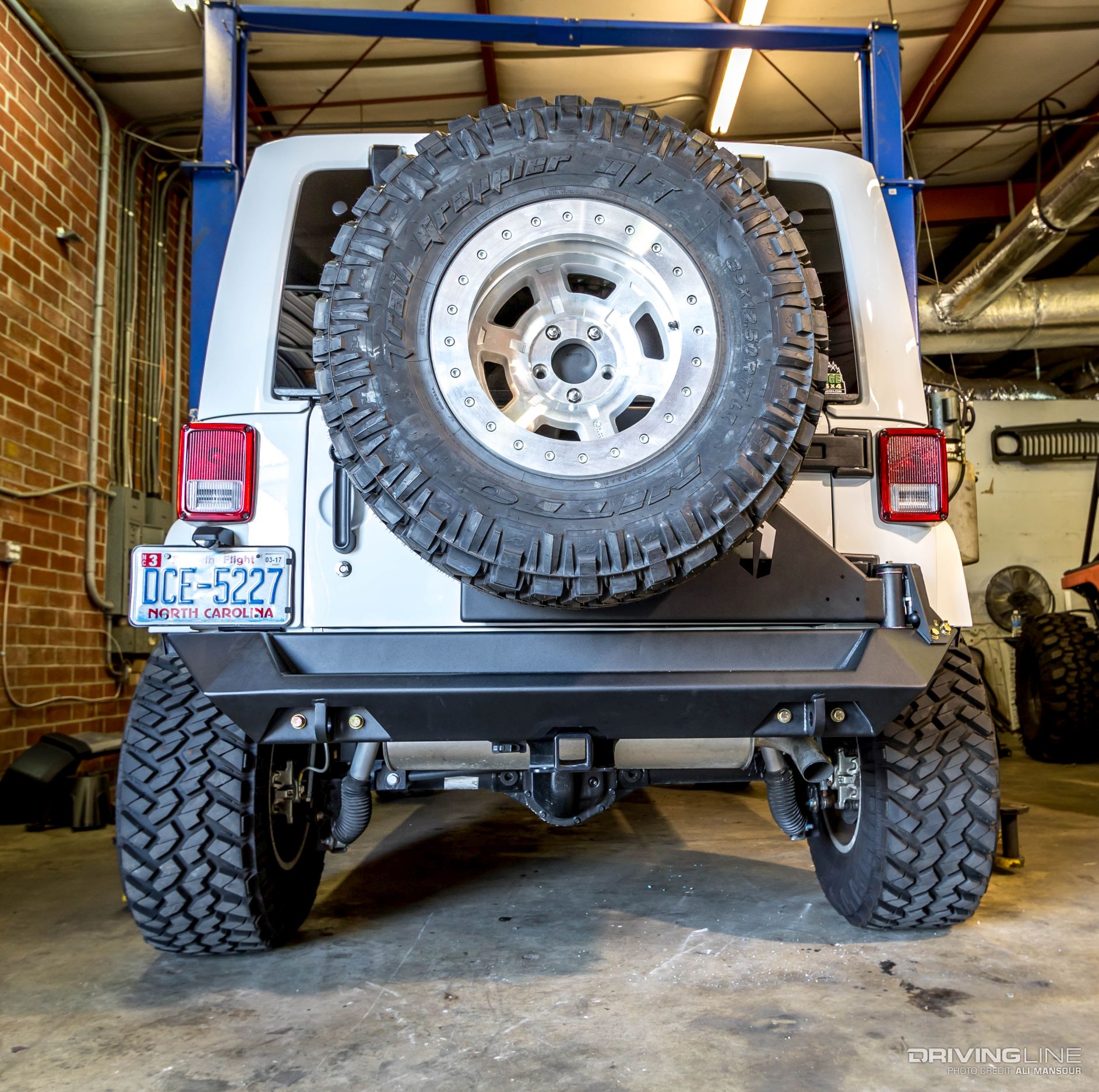 016-2015-jeep-wrangler-fab-fours-tire-carrier-rear-bumper