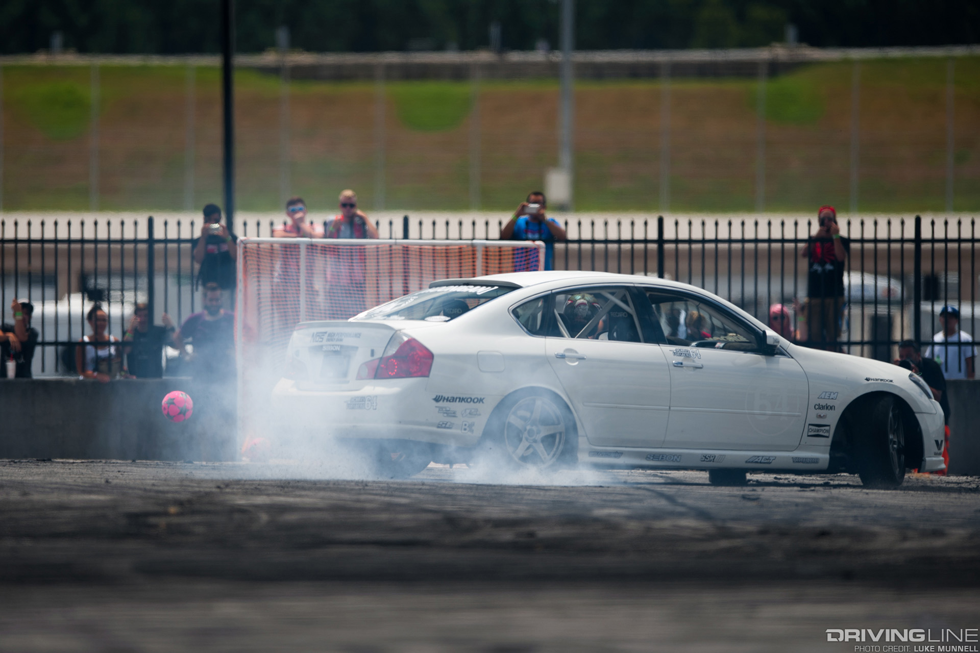 Tommy Van Cleef, local drift driver in the white/red/orange JZA70 Toyota Supra at Street Driven Tour Atlanta
