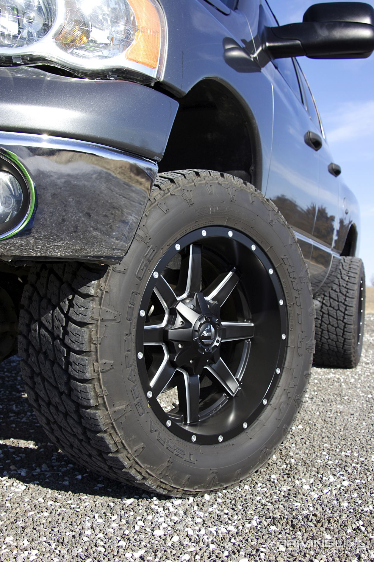 305/55R20 Nitto Terra Grappler G2s mounted to 20x10 Fuel Maverick wheels